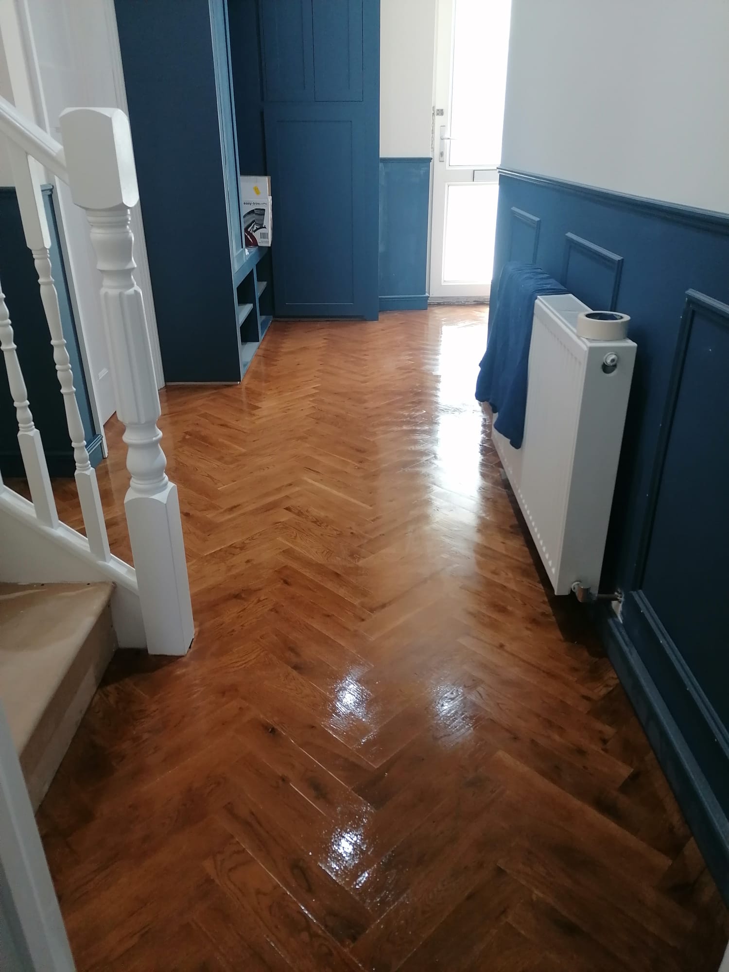 Herringbone wooden floor hallway